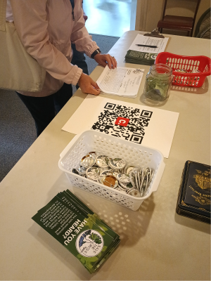 Display table with buttons, flyers, and other STGA committee items